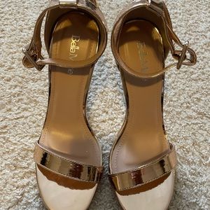 Rose gold cinderella wedge heel.